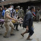 A group of men carry a person on a stretcher (EPA/Narenda Shrestha)